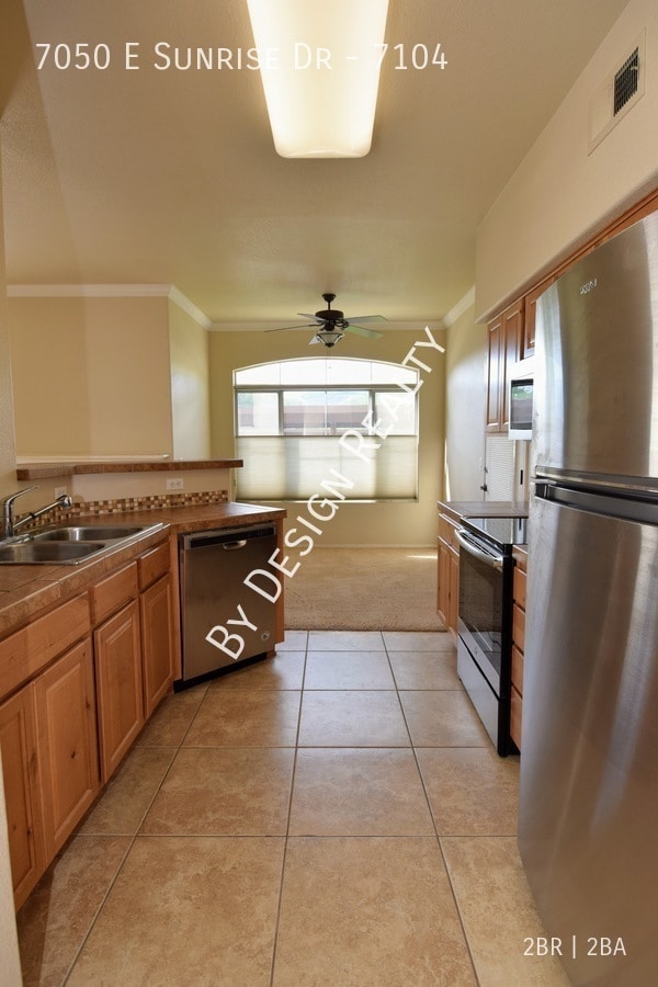 Building Photo - 7050 E Sunrise Dr