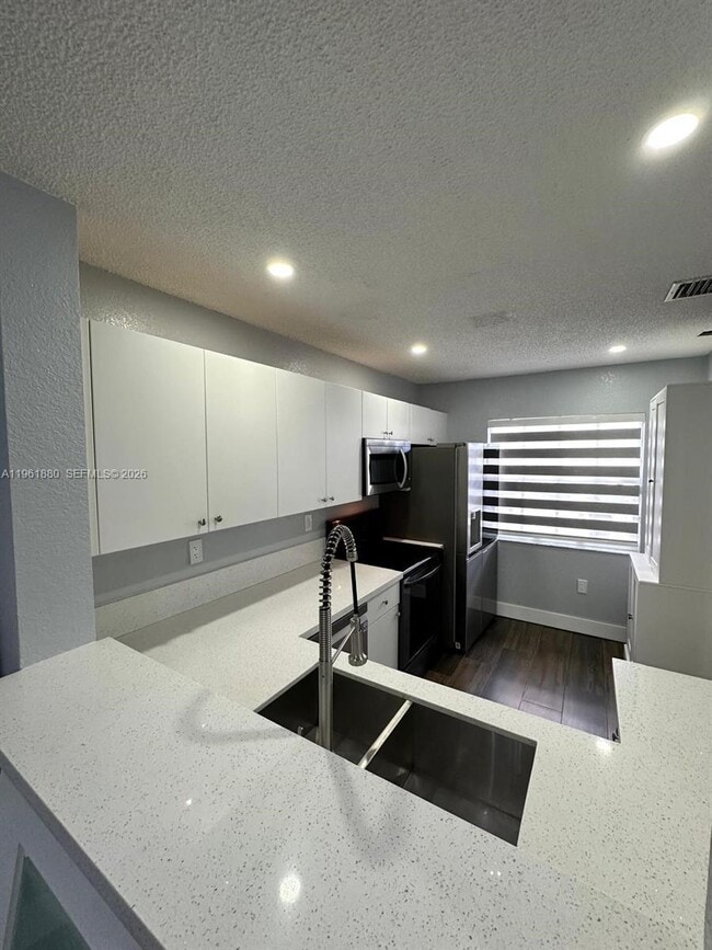 Building Photo - 14307 SW 120th Ct