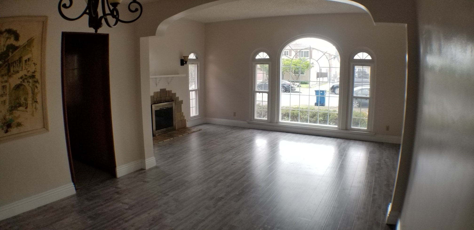 Arched picture window facing street - 512 S Flower St
