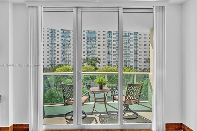 Building Photo - 19380 Collins Ave