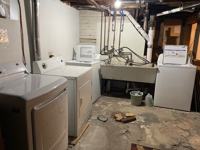 Shared laundry - 2 washers & dryers shared with owner - 2320 Monroe St NE