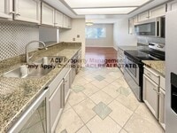 Building Photo - Bright 2BR/2BA Condo with Garage & Pool in...