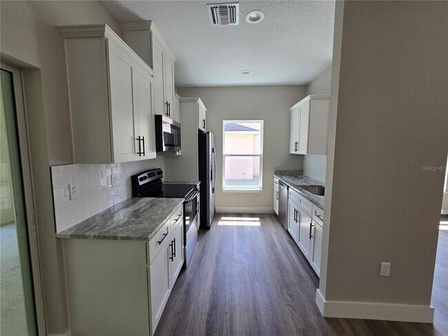 Building Photo - 7437 Mead Dr