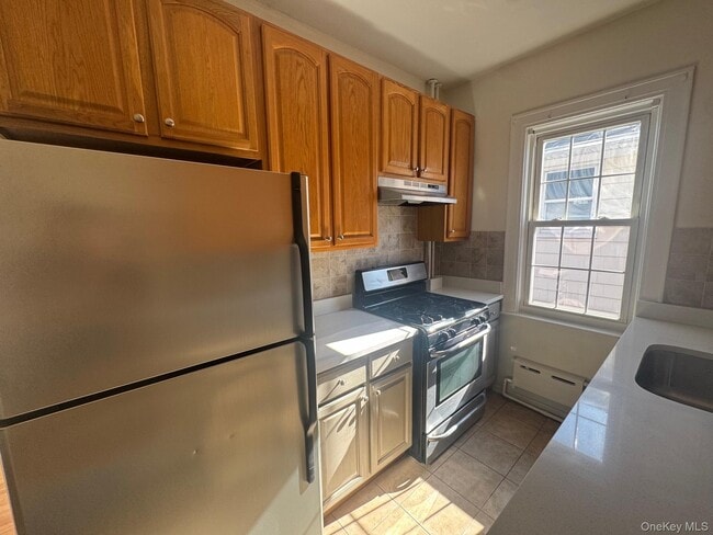 Building Photo - 214-06 36th Ave