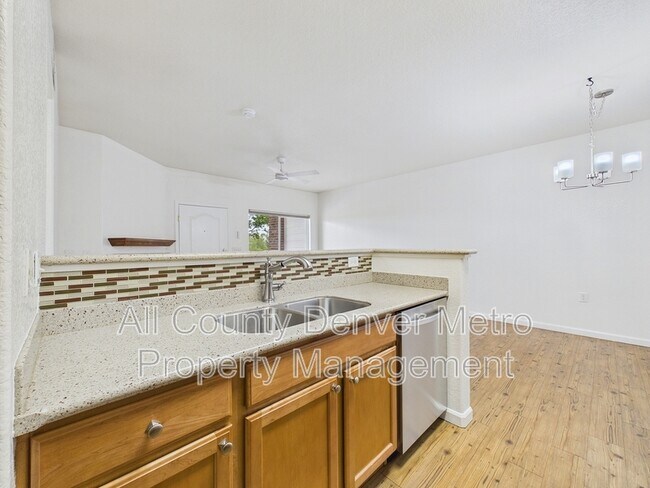 Building Photo - 10239 W 55th Dr