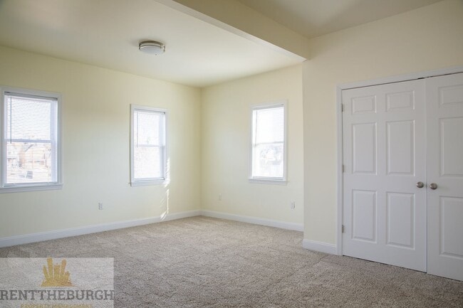 Building Photo - Updated 4BR House with 2 full baths and yard!