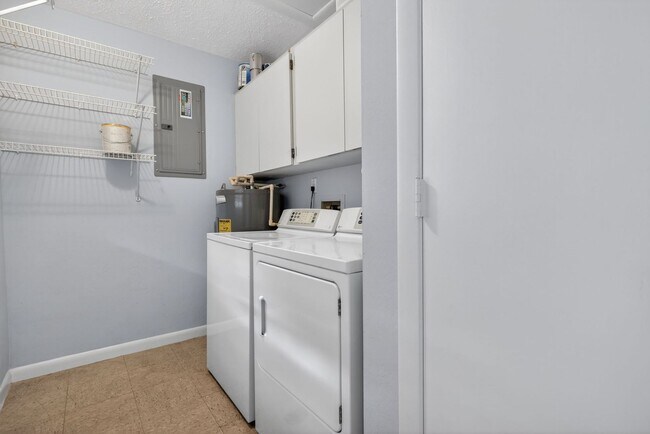 Building Photo - Gulf Access 2 bedroom 2 Bath Fully updated Condo with Water View