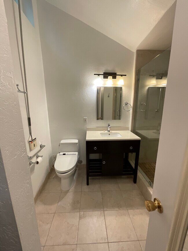 On suite bathroom with bidet toilet seat and large walk-in shower - 2452 Harding Ave