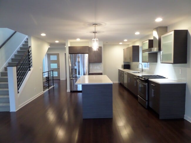 Building Photo - Immaculate and LARGE 4-Bedroom Home in Unb...