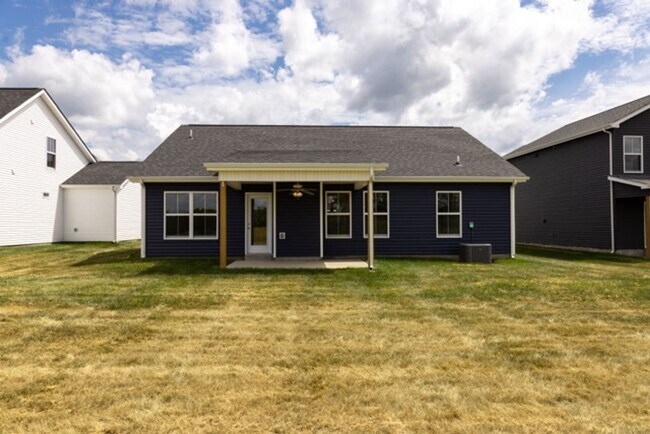 Building Photo - Modern Living Redefined with Stone Fireplace, Gray Cabinetry, Spa Inspired Primary Suite and Cove...