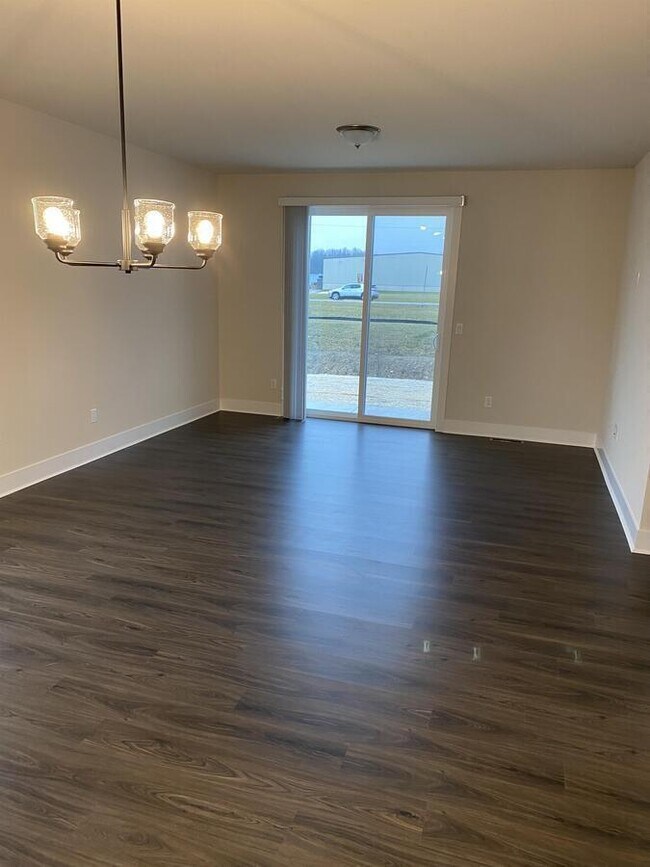 Building Photo - W218N16046 Tiger Lily Dr