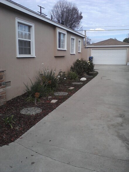 Side yard, roses with long driveway - 4734 Allott Ave