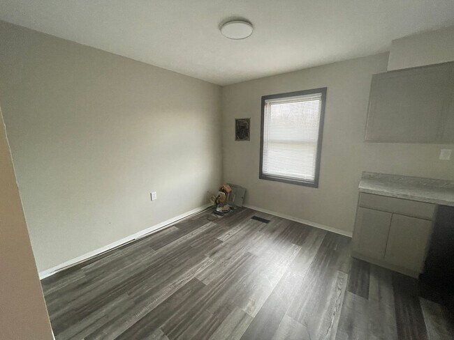 Building Photo - Oversized 3 Bedroom with laundry room!