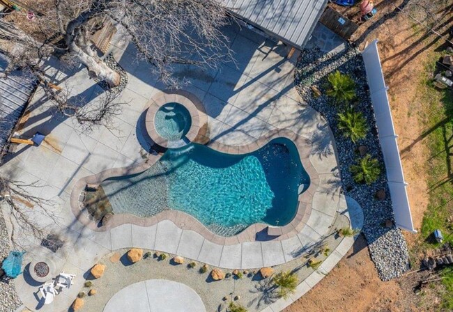 Building Photo - A Private Oasis with Unmatched Amenities 4 Bedroom 3 Bath