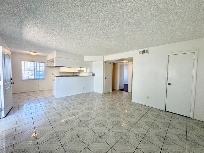 Building Photo - DOWNSTAIRS CONDO | RECENLY REHABBED 2 BEDROOM 1 BATH | ACROSS FROM CSN CHEYENNE