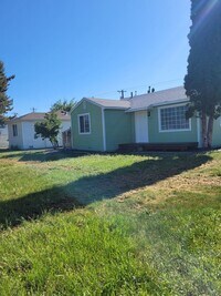 Building Photo - Free May rent with 1 Year Lease - Fully Remodeled with Garage & Yard Care Included