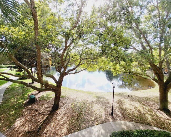 Building Photo - Stunning 2/2 Condo For Rent in Mirabella - Superb Location!