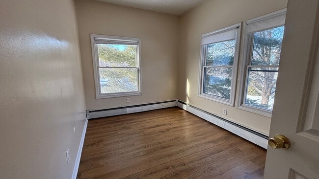 Building Photo - 4 Bedrooms 1.5 Bath Apartment with Heat and Hot Water Included!