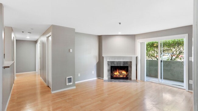 Building Photo - This ground floor corner-unit condo
