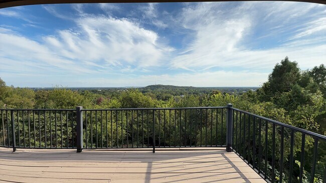 Building Photo - Welcome home to breathtaking views in this...