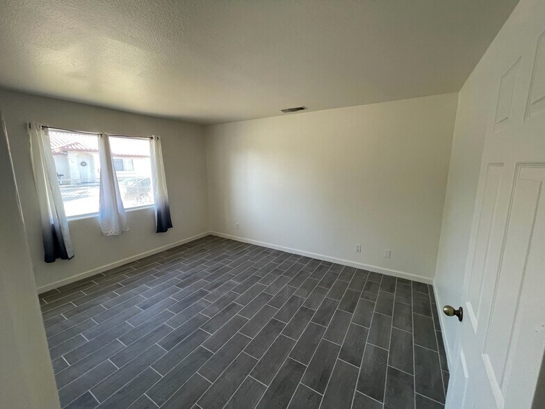 Building Photo - 6686 Palo Verde Ave