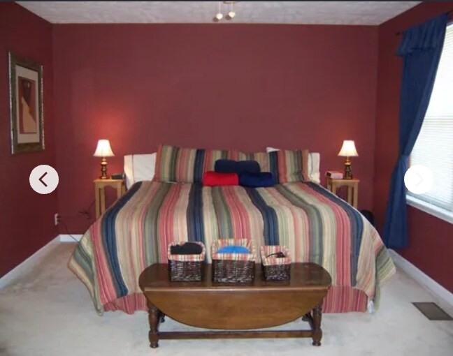 large master bed, no longer red but neutral beige - 2950 Baby Ruth Ln