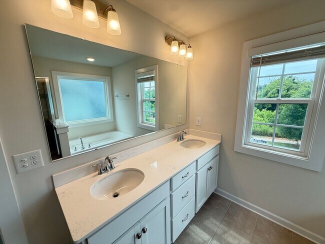 Building Photo - Beautiful Westbranch Home with 2-Car Garage, Covered Porch & Greenway Entrance Across the Street