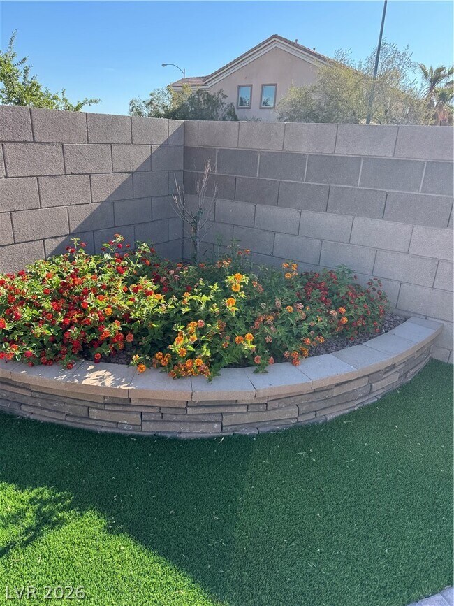 Building Photo - 7490 Lush Oasis Ave.