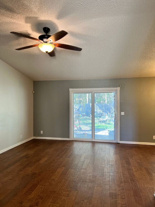 Building Photo - Four bedroom with a fenced in yard!