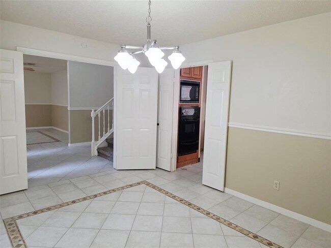 Building Photo - 10306 Jockey Club Dr