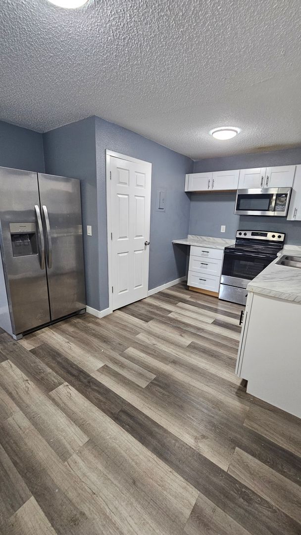 Building Photo - $1313 - 3BR/1BA Pet-Friendly 4Plex near Memorial Park in Colorado Springs