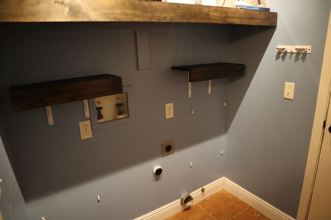 Building Photo - Home With A Pool and Much More!