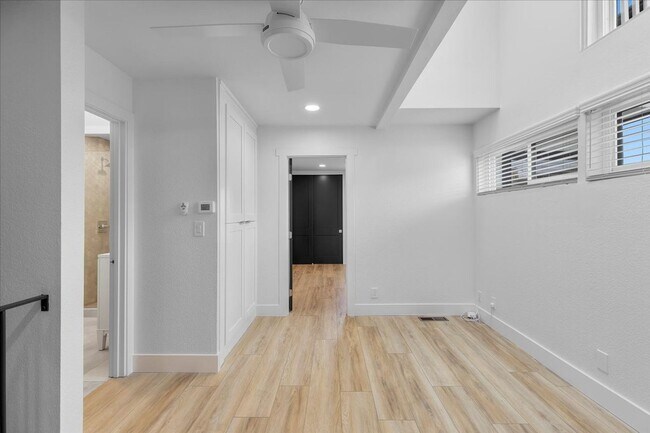 Building Photo - COMPLETELY REMODELED, BRIGHT & AIRY, TRI-LEVEL HOME W/ TOP-FLOOR GREAT ROOM LIVING SPACE, 2-CAR G...