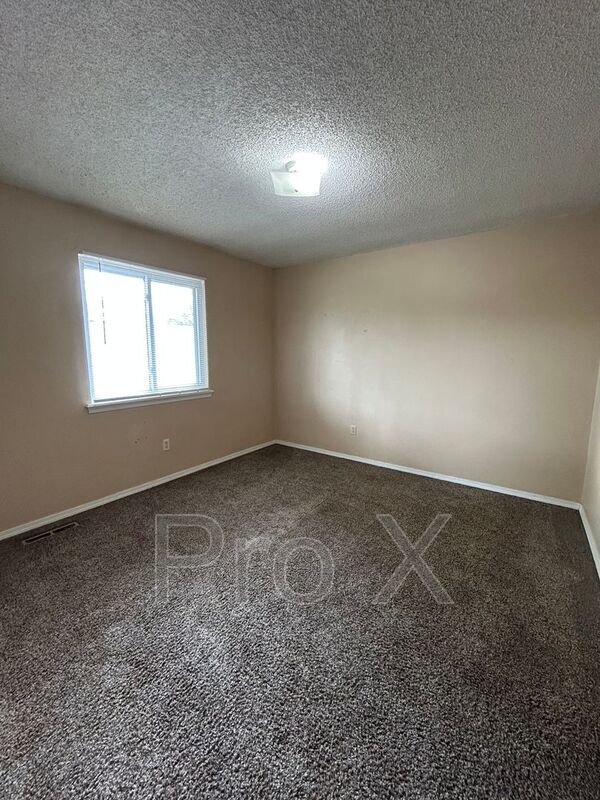 Building Photo - 1108 S Joplin St