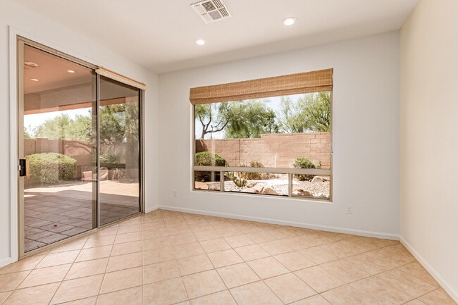 Building Photo - "Charming 2-Bedroom + Den Oasis with Spaci...