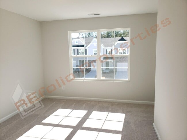 Building Photo - Brand New 3 BR 1-Car Garage Townhome in Do...