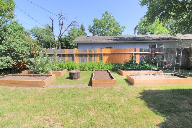 Building Photo - Meticulously Remodeled Milwaukie Bungalow on Large Lot with Gardens & Garage