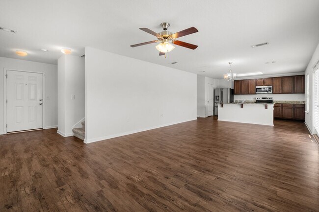 Building Photo - OPEN CONCEPT 4 BED / 2.5 BATH - Community Pool