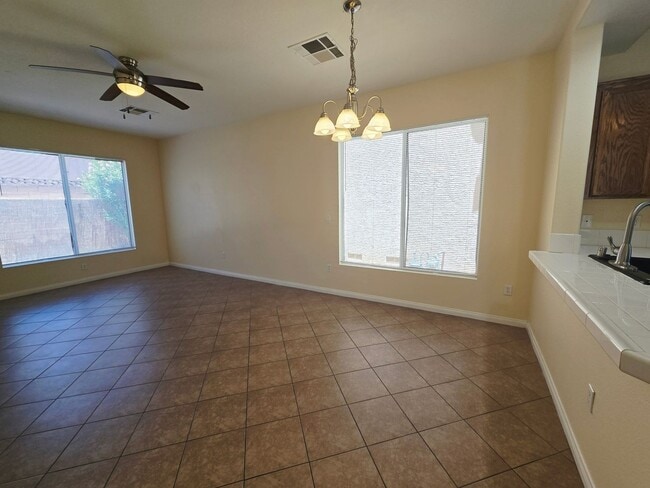 Building Photo - 8295 Golden Flowers St
