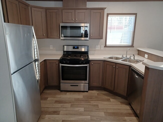 Building Photo - 5200 Champagne Dr
