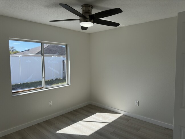 Building Photo - Remodeled 4-bedroom 2 bath 2 car garage in...