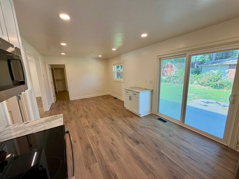 View from the kitchen into the dining room. - 329 Ronald Dr