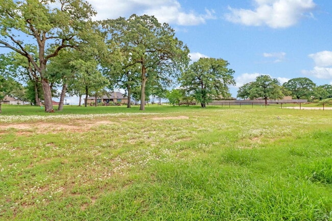 Building Photo - "Charming 4-Bed Oasis with Granite Touches & Cozy Fireplace in Floresville!"