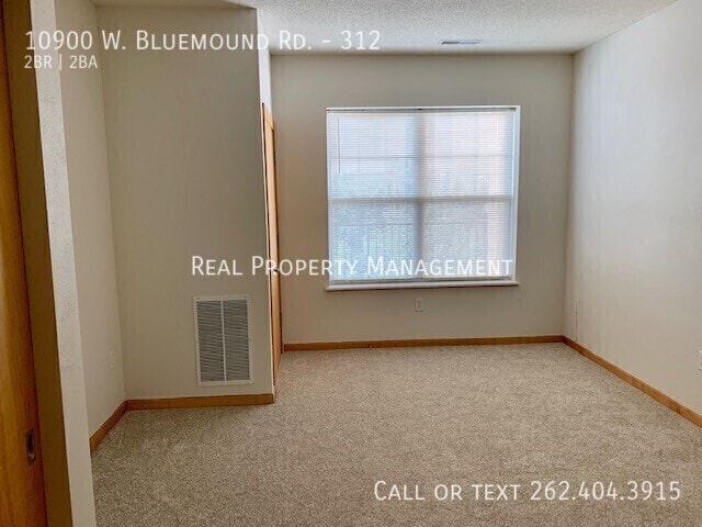 Building Photo - 10900 W Bluemound Rd