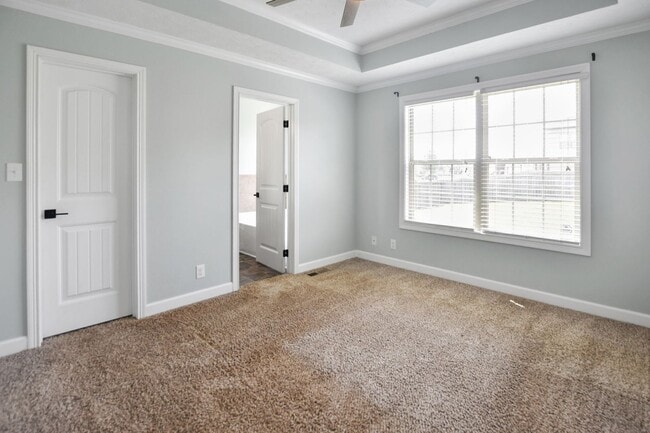 Building Photo - Pet Friendly Three Bedroom with Bonus!