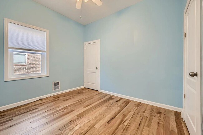Building Photo - Charming 3 Bedroom/2.5 Bathroom Townhome in Patterson Park with Parking Pad!