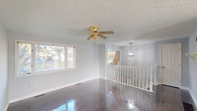 Building Photo - 4-Bedroom Split-Level Updated Home with Garage, Deck, and Large Backyard