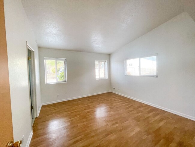 Building Photo - This gorgeous Pine Hills home has a large interior, 2-car garage, and fully-fenced yard!