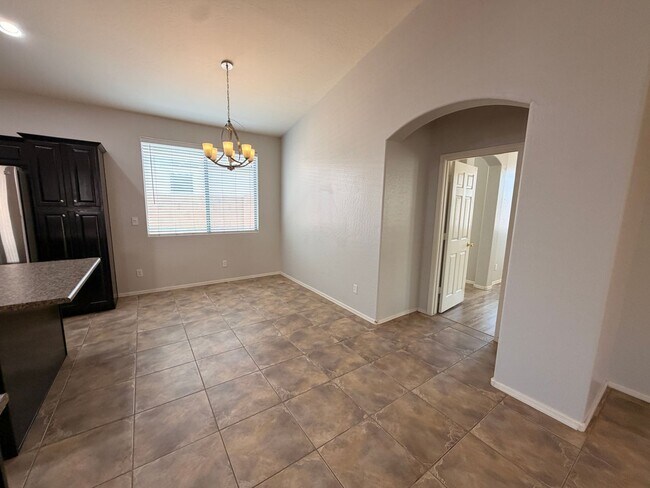 Building Photo - *NEW* Custom Paint/*NO* Carpet 3 BD/2 Bath Spacious Surprise Home!