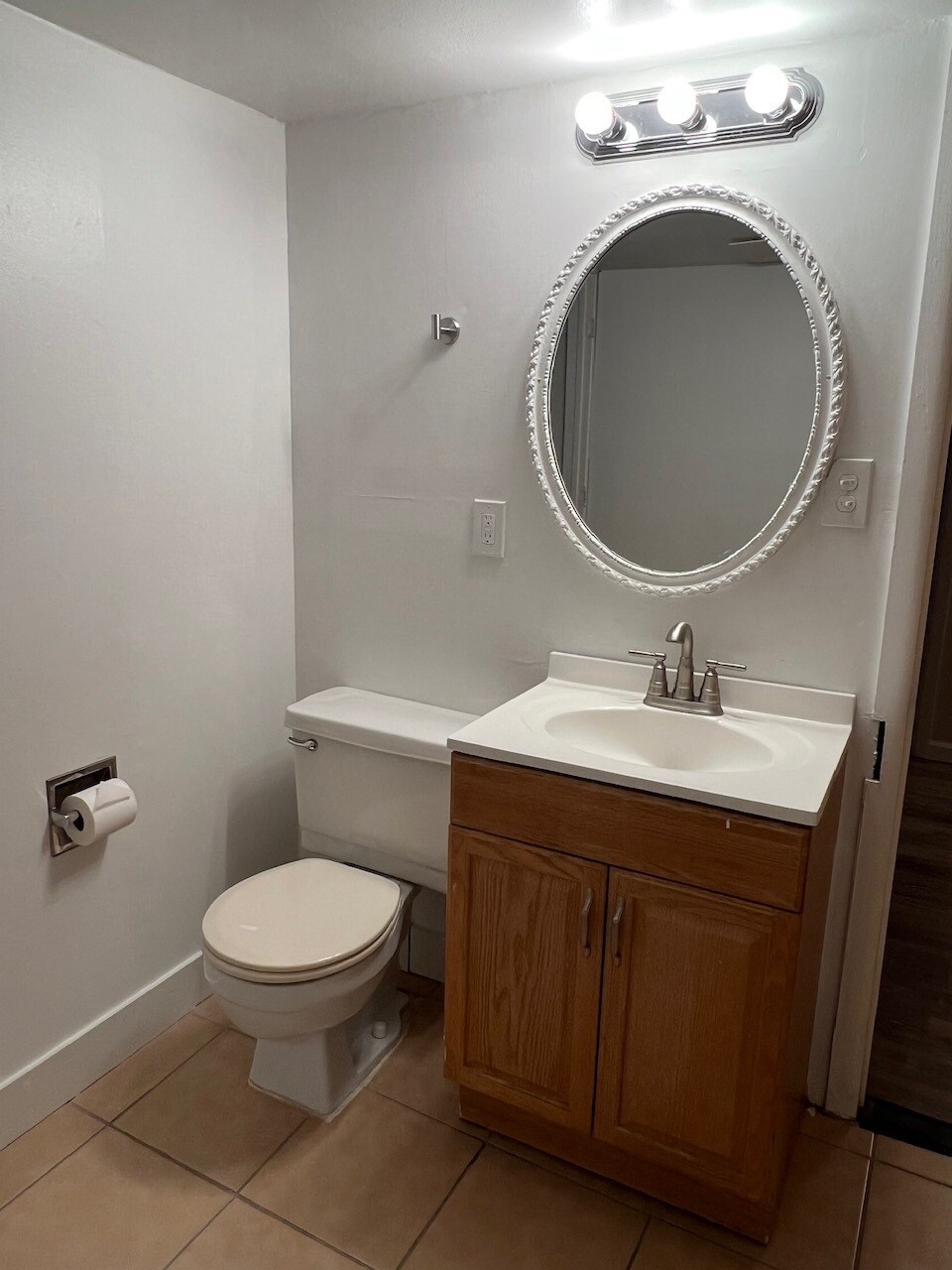 Basement half-bathroom. New hardware - 6396 E Mississippi Ave